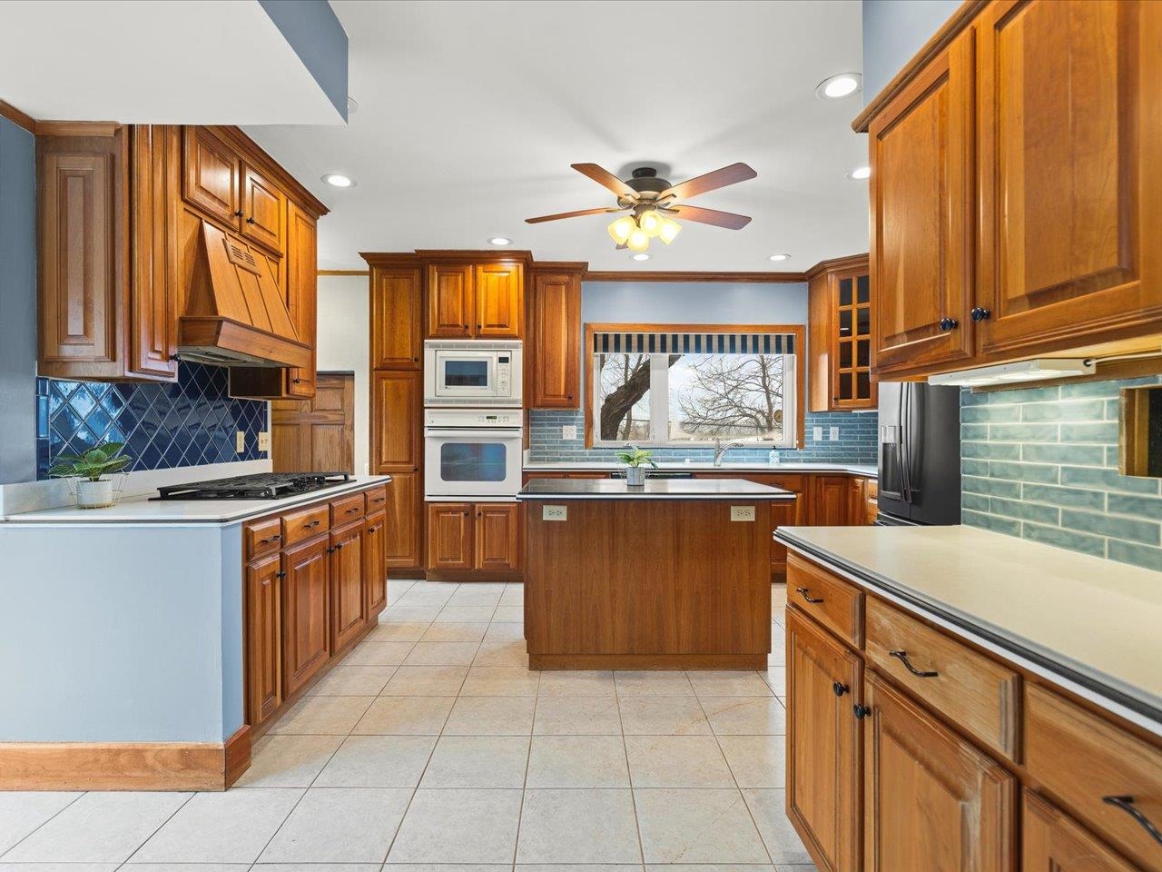 2014 Glenview Road Rockford, IL 61107 - Photo 26 of 82 a kitchen with stainless steel appliances granite countertop a stove and a sink