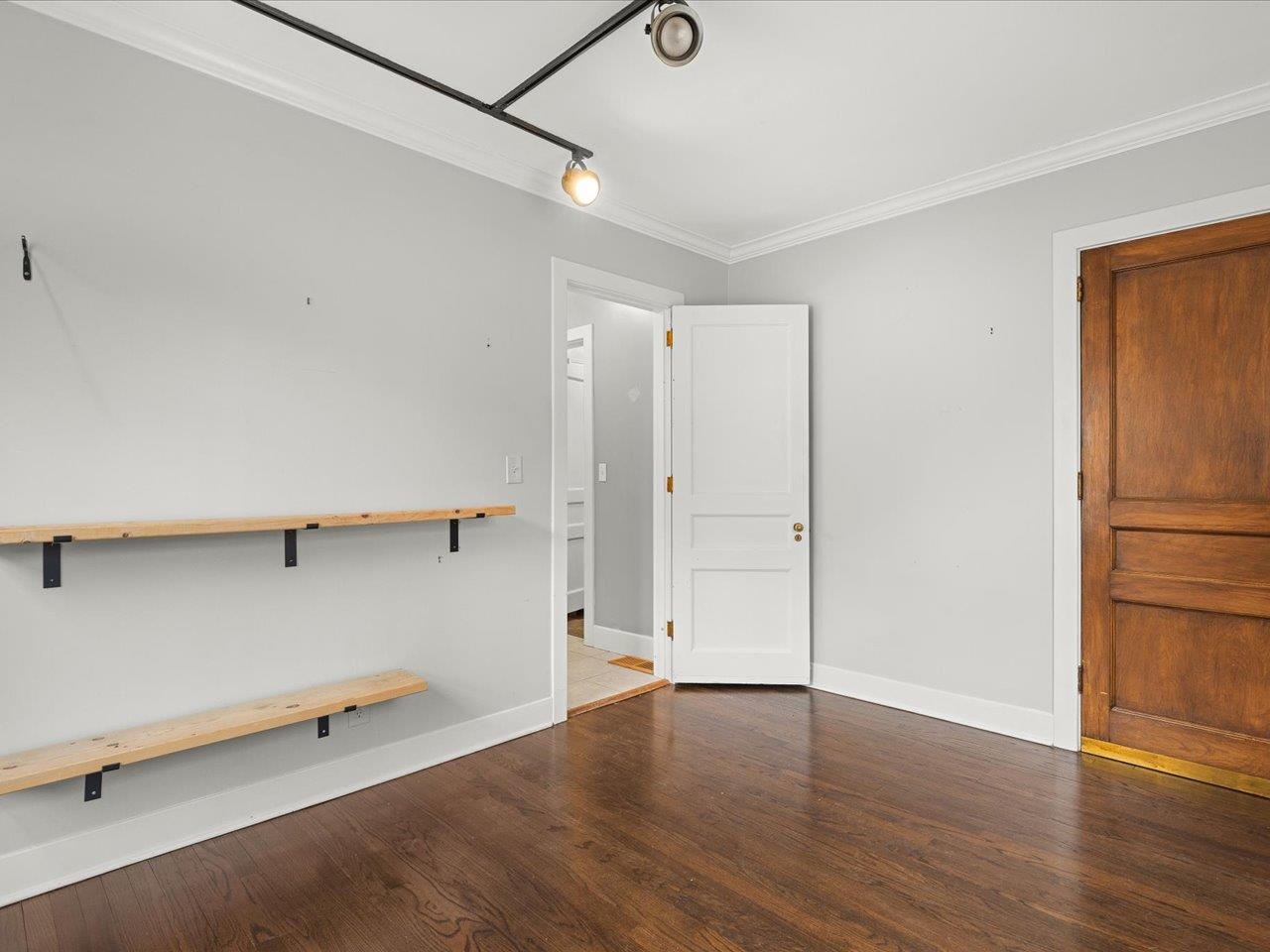 2014 Glenview Road Rockford, IL 61107 - Photo 33 of 82 a view of an empty room with wooden floor