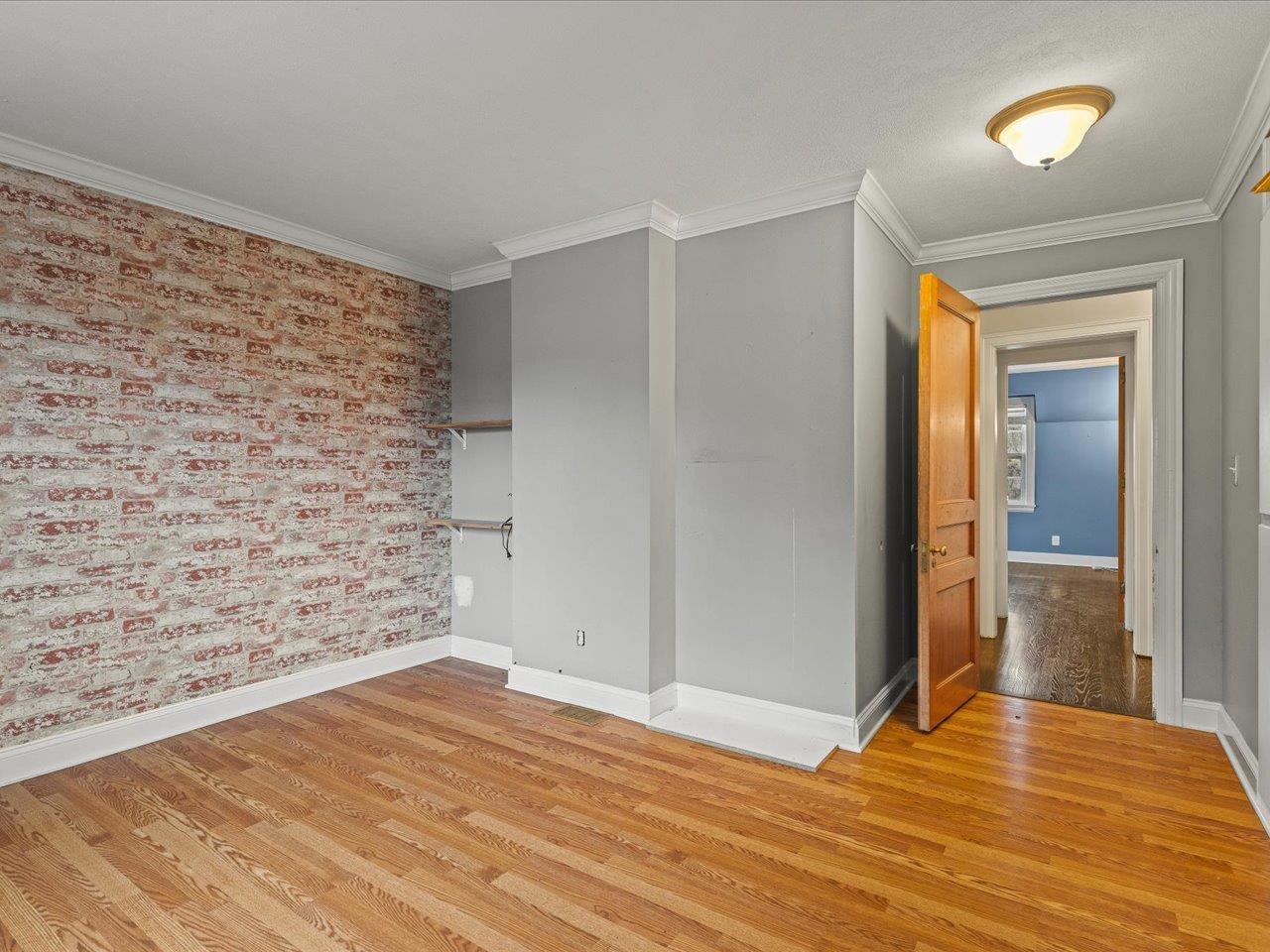 2014 Glenview Road Rockford, IL 61107 - Photo 50 of 82 a view of empty room with wooden floor and fan