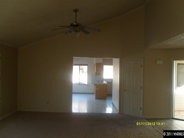735 Icarus Court Reno, NV 89512 - Photo 3 of 13 a view of empty room with windows