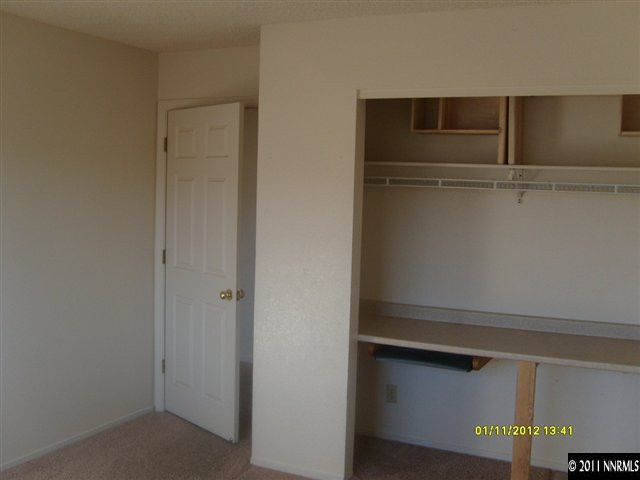 735 Icarus Court Reno, NV 89512 - Photo 7 of 13 a view of an empty walk in closet