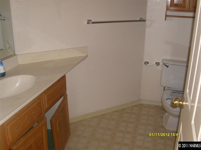 735 Icarus Court Reno, NV 89512 - Photo 8 of 13 a bathroom with a shower and a sink