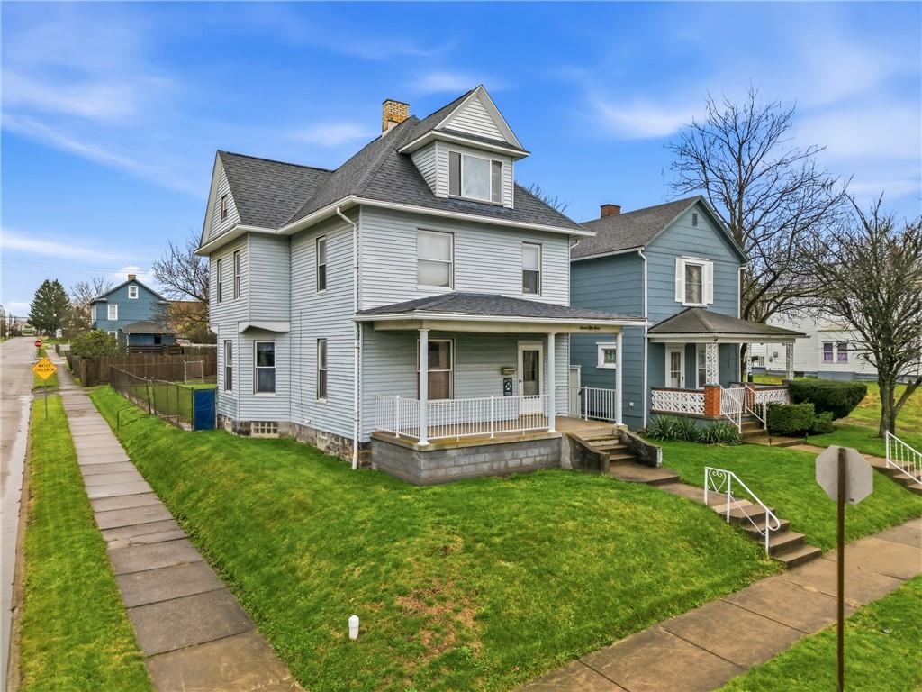 753 Spruce Avenue Sharon, PA 16146 - Photo 1 of 31 a front view of a house with a yard