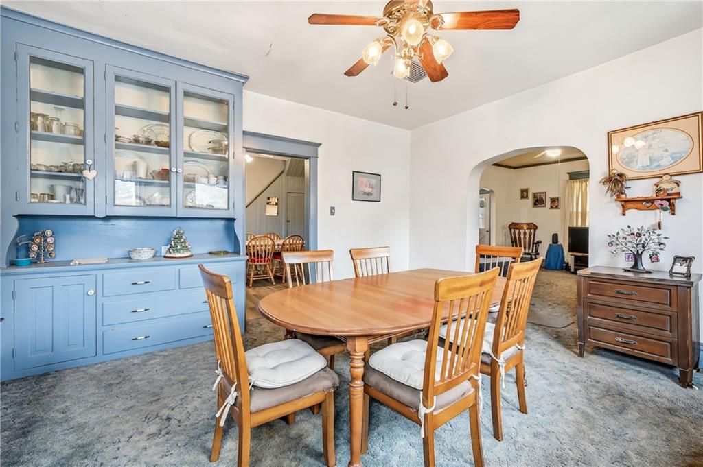 753 Spruce Avenue Sharon, PA 16146 - Photo 11 of 31 a view of a dining room with furniture and chandelier