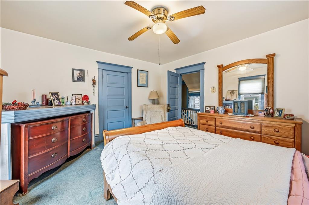 753 Spruce Avenue Sharon, PA 16146 - Photo 18 of 31 a bedroom with a large bed and a dresser