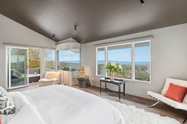 a view of balcony with furniture