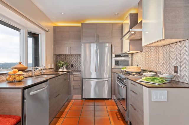 a living room with furniture and flowers