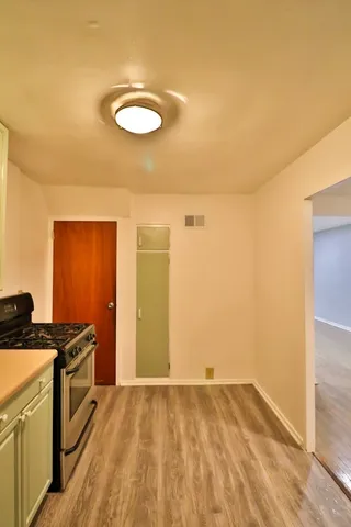 a view of a livingroom with a stove