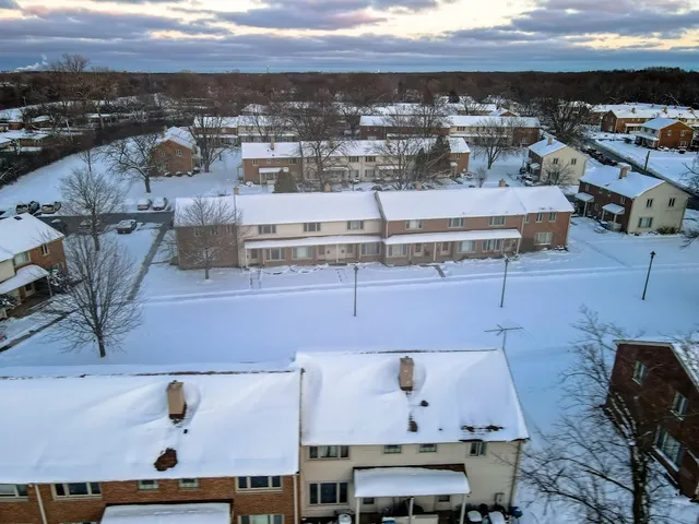 a view of roof deck with furniture