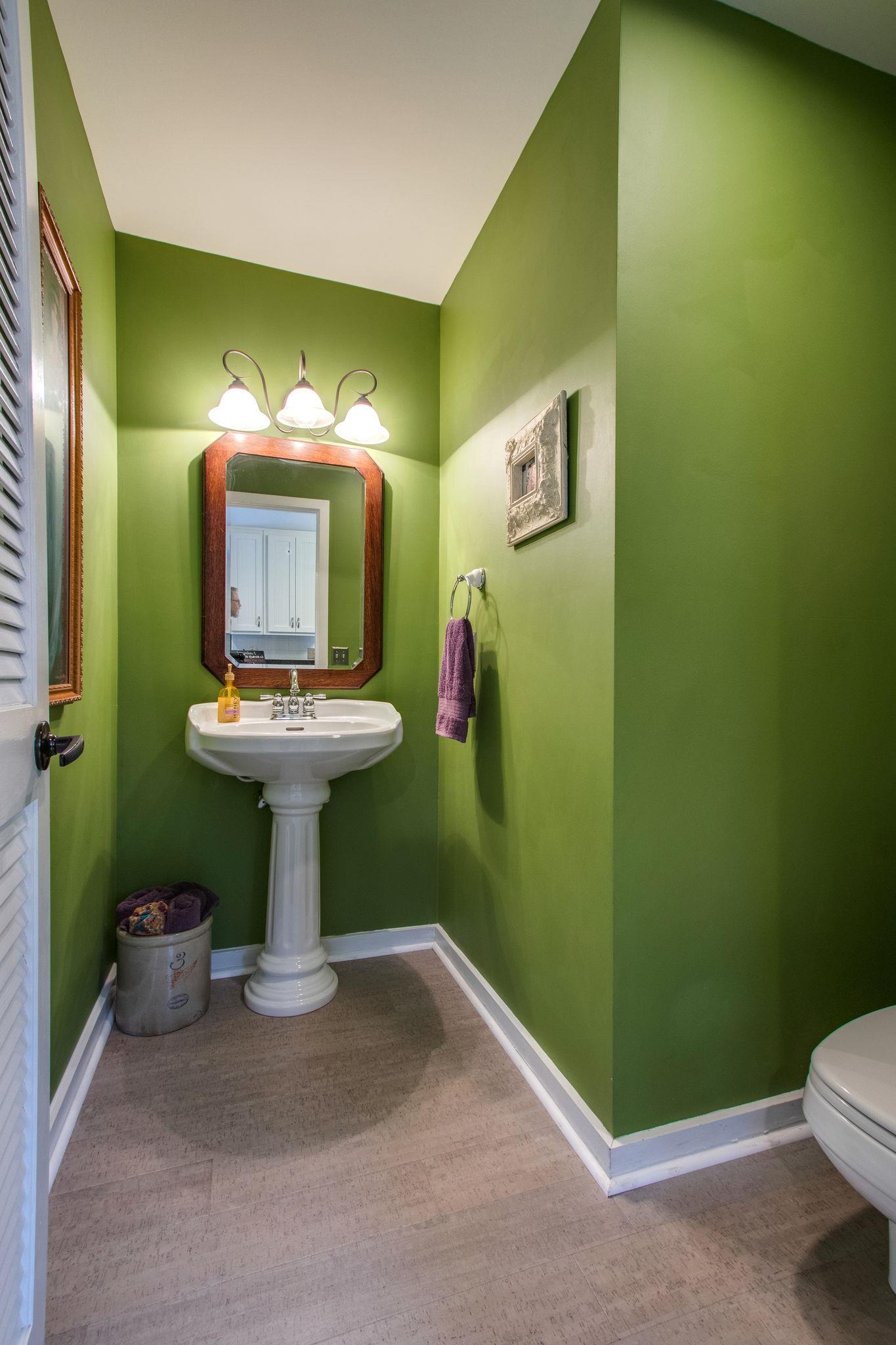 1922 Arlington Road Lebanon, TN 37087 - Photo 11 of 30 a bathroom with a sink mirror and toilet