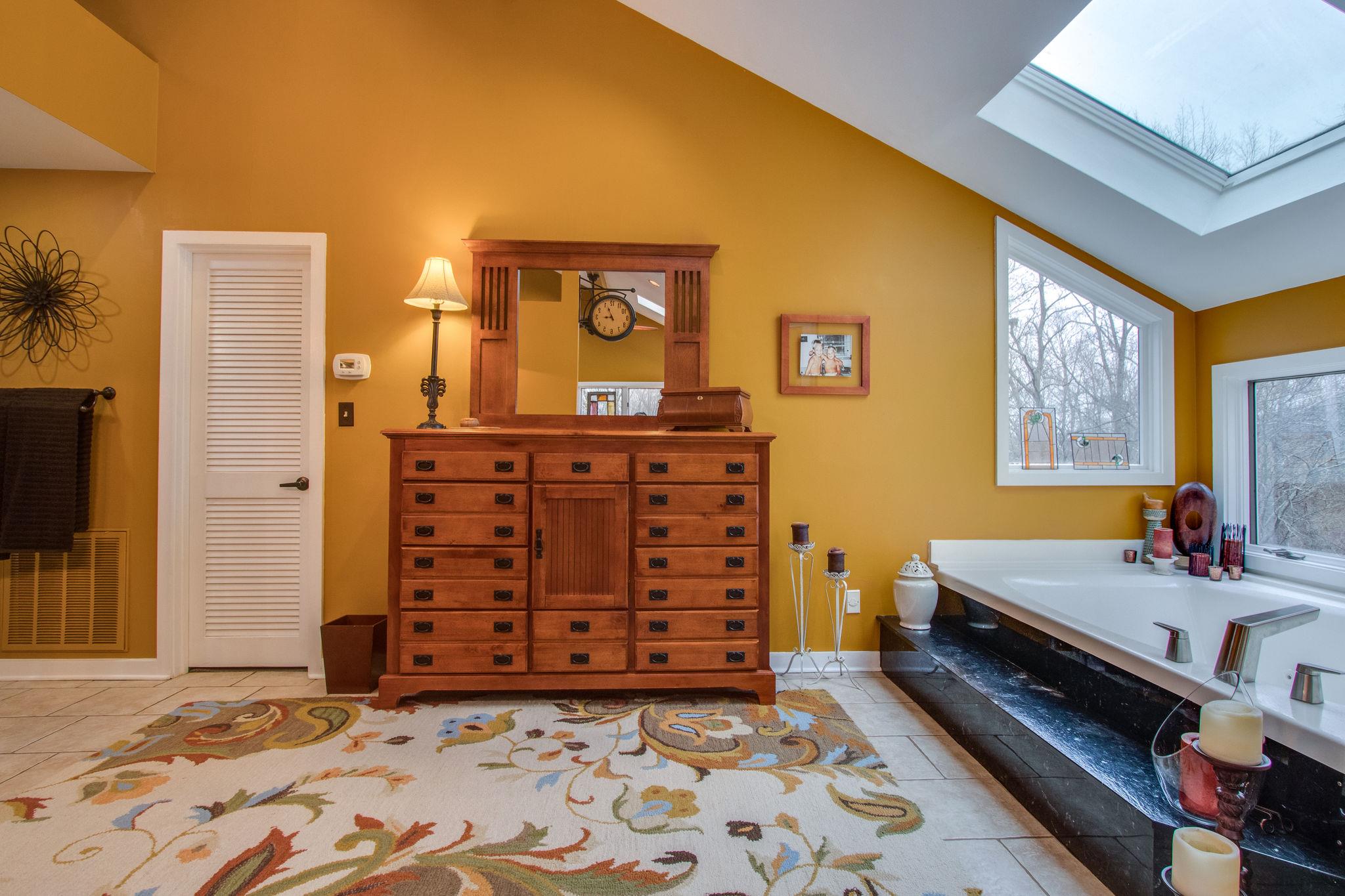 1922 Arlington Road Lebanon, TN 37087 - Photo 22 of 30 a room with a baby crib and a dresser