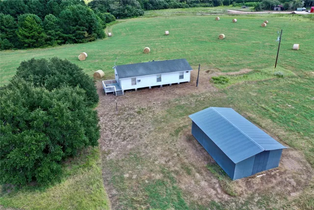 a view of a bench in a garden