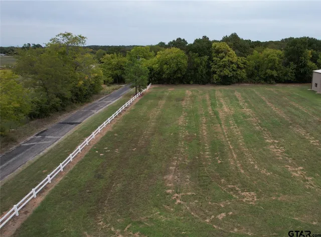a view of a back yard of a house