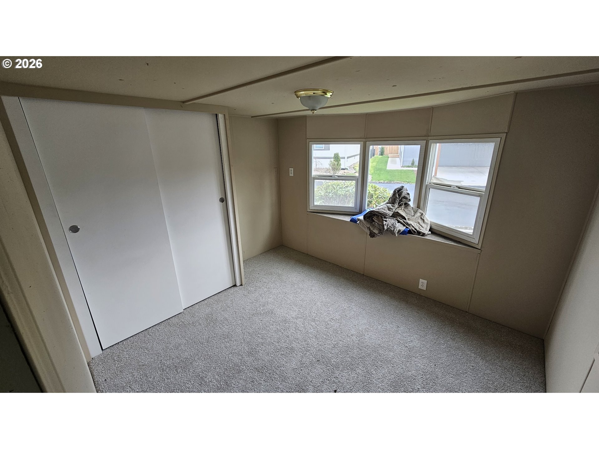 18780 South Central Point Road, Unit 20 Oregon City, OR 97045 - Photo 12 of 16 a open hall with a fireplace