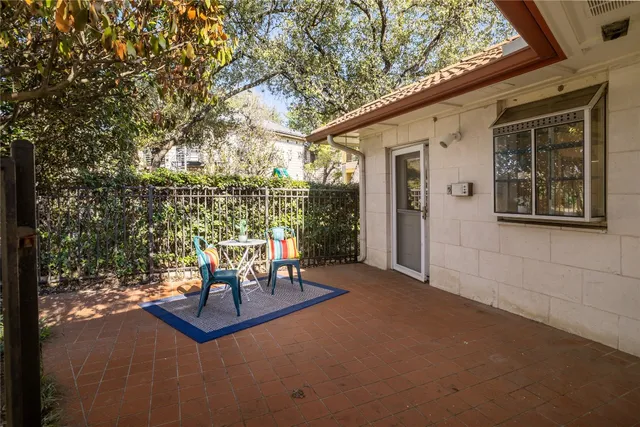 a bench sitting in front of a building