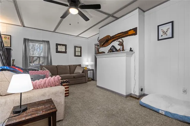 a living room with furniture and a couch