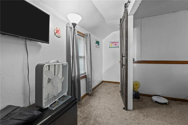 a view of a storage and utility room