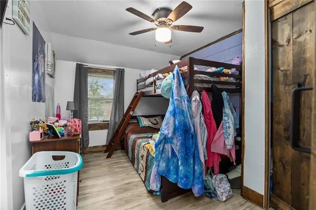 a view of a closet with storage and utility