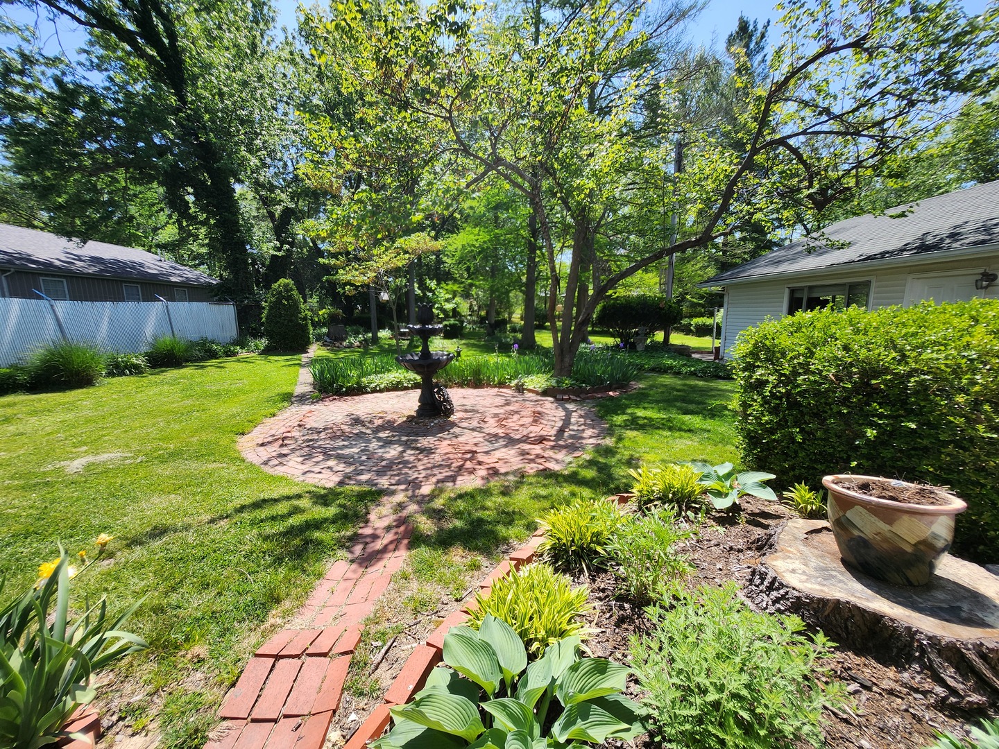766 East Fairfield Road Mount Vernon, IL 62864 - Photo 108 of 134 a view of a backyard with potted plants and large trees