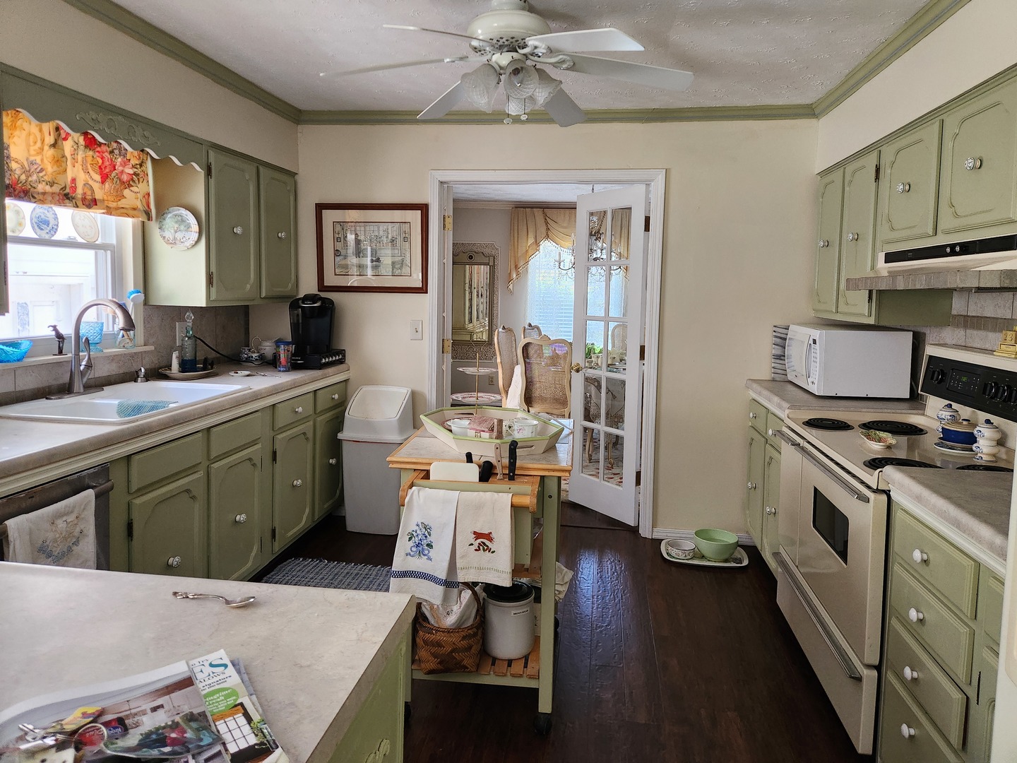 766 East Fairfield Road Mount Vernon, IL 62864 - Photo 31 of 134 a kitchen with a sink stove and wooden floor