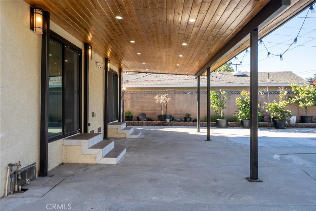 5339 East Greenmeadow Road Long Beach, CA 90808 - Photo 21 of 34 a view of a hall with floor to ceiling window