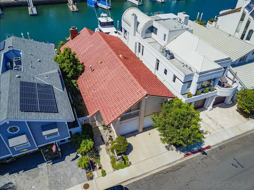 23 Sandpiper Strand Coronado, CA 92118 - Photo 2 of 25 an aerial view of a house with outdoor space pool seating area and yard