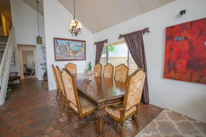 23 Sandpiper Strand Coronado, CA 92118 - Photo 6 of 25 a view of a dining room with furniture and a chandelier