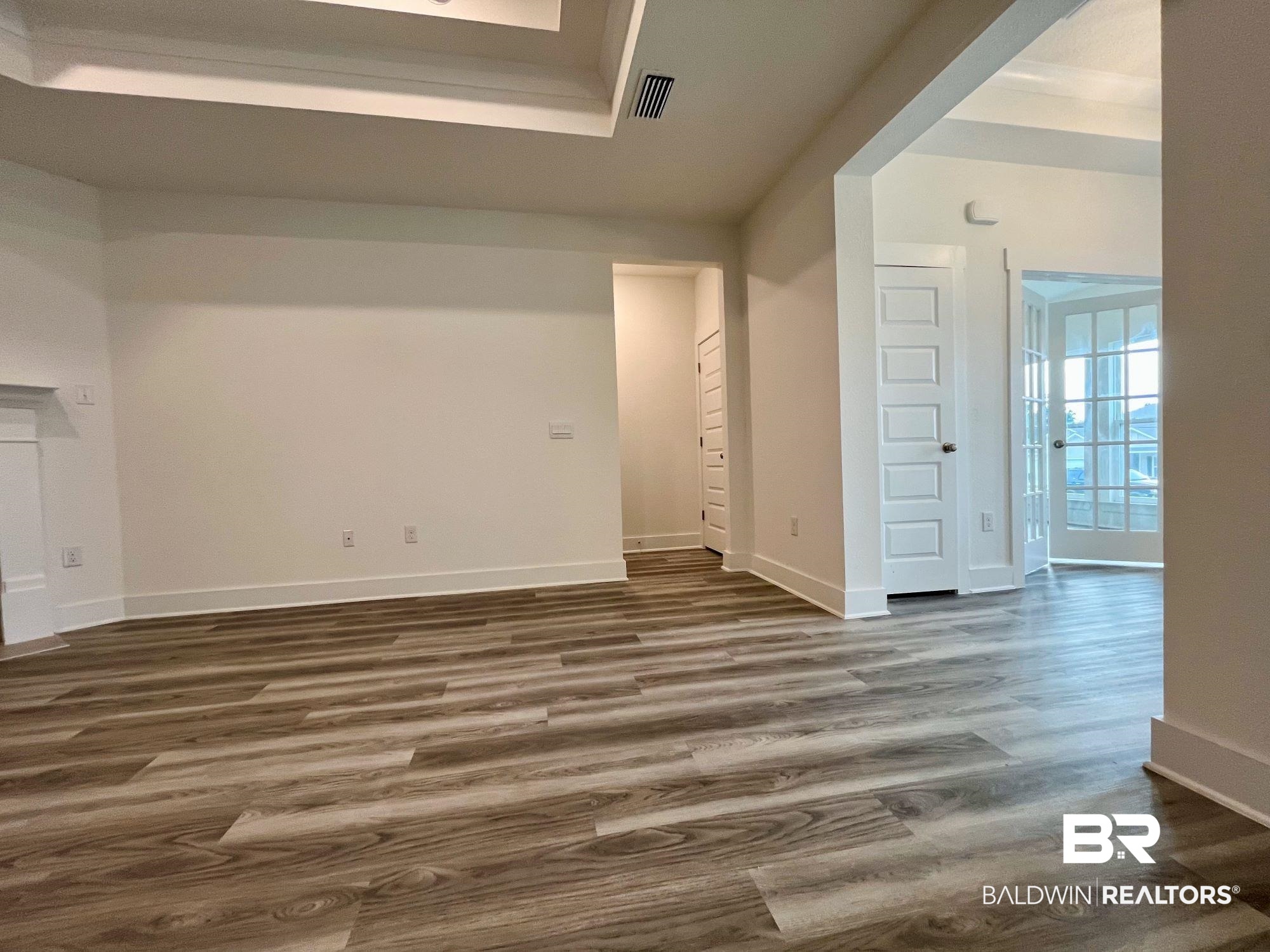334 Barndling Street Fairhope, AL 36532 - Photo 24 of 34 Spare room featuring dark hardwood / wood-style flooring