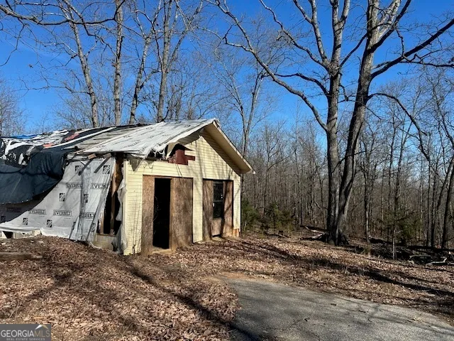 a view of a house with a snow covered with snow