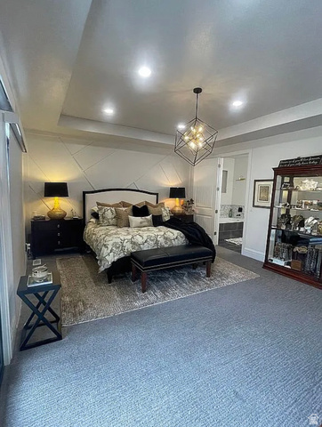 838 East Mountain Road North Ogden, UT 84414 - Photo 17 of 37 Recessed ceiling lighting, a geometric pendant light fixture, and a tray ceiling illuminate this carpeted room