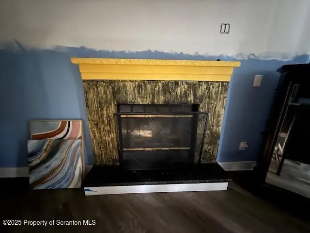 a living room with a fireplace