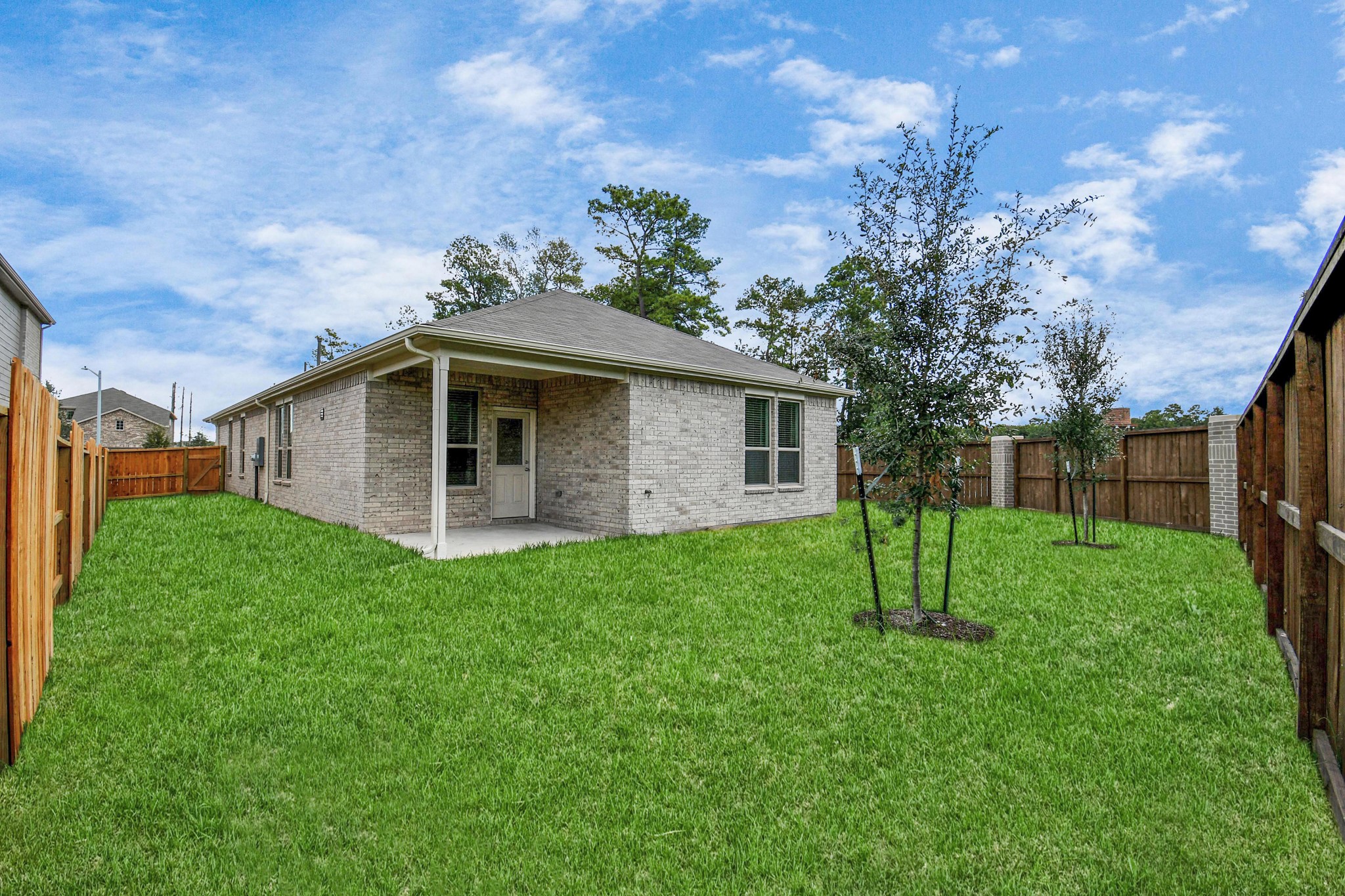 16150 Elbridge Court Conroe, TX 77302 - Photo 26 of 46 Spacious backyard with cover patio.