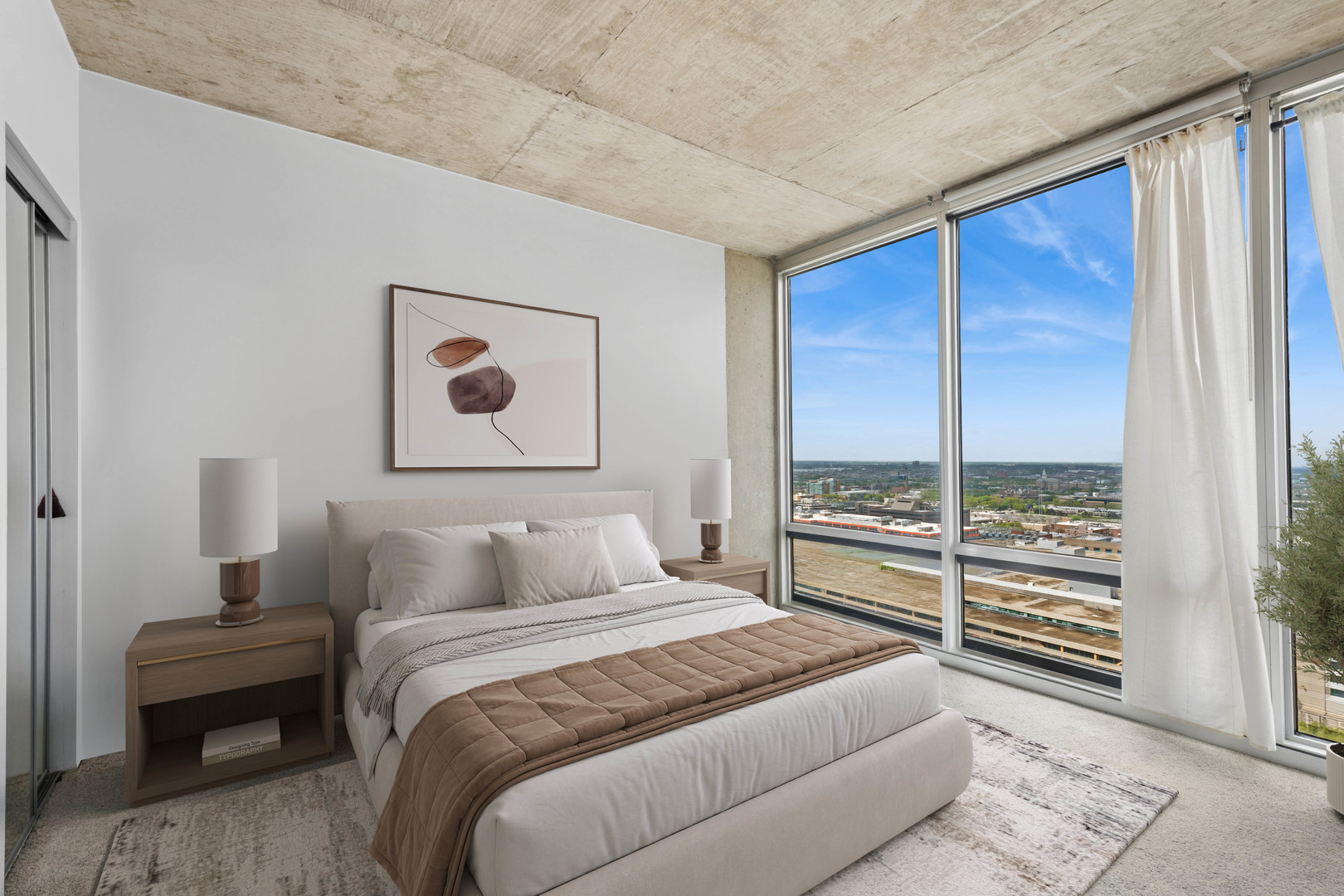 611 South Wells Street, Unit 2904 Chicago, IL 60607 - Photo 11 of 18 a bedroom with a large bed and a window