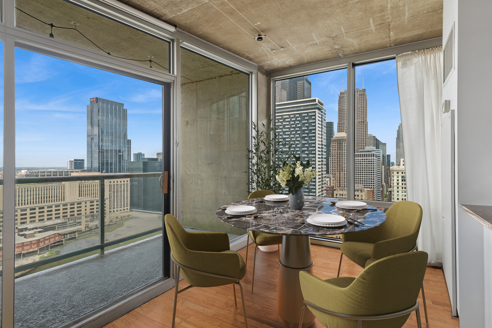 611 South Wells Street, Unit 2904 Chicago, IL 60607 - Photo 4 of 18 a dining room with furniture and window