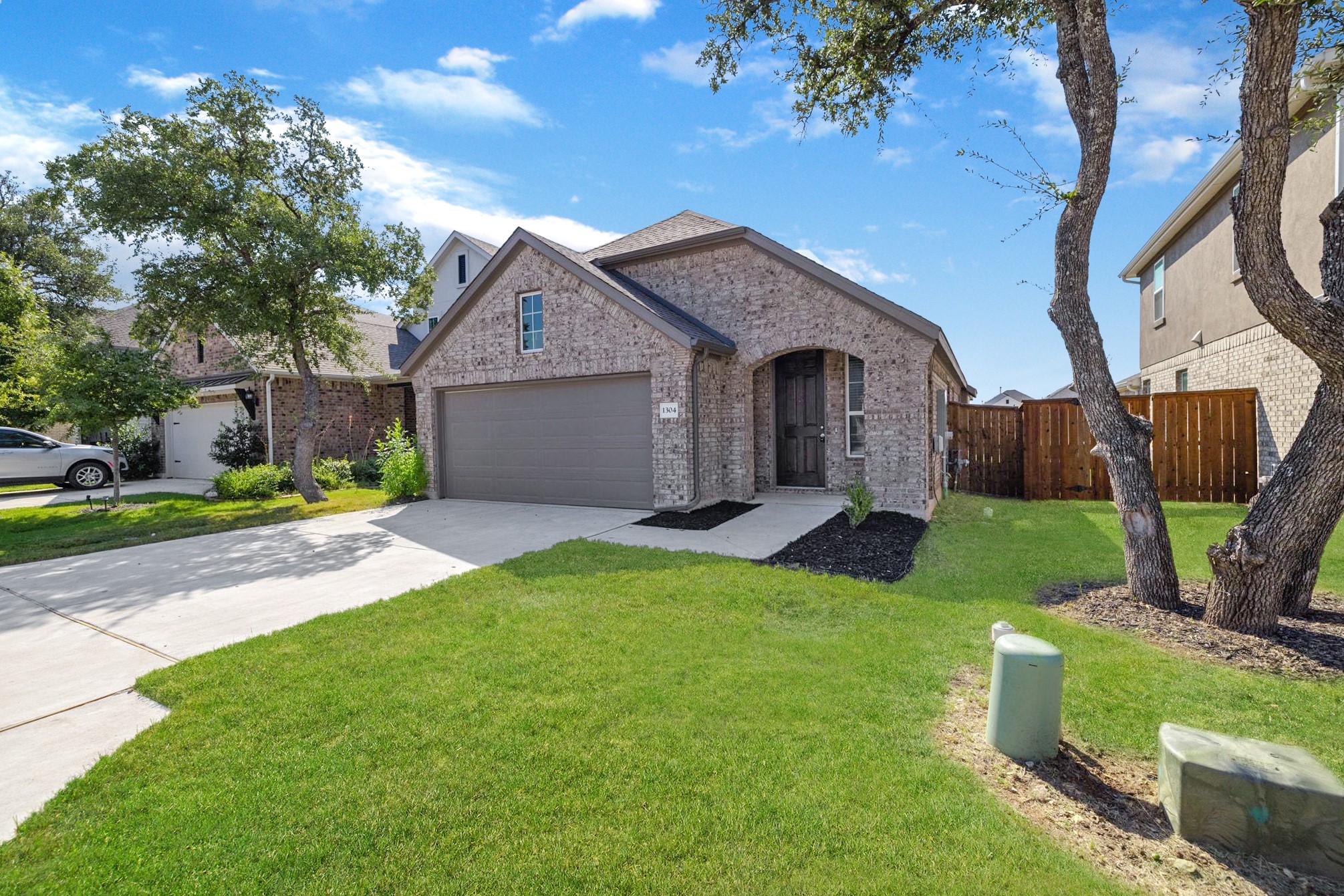 1304 Salt Lick Drive Georgetown, TX 78633 - Photo 1 of 1 a front view of a house with garden