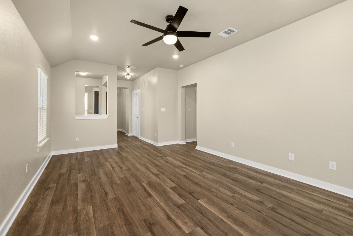 1304 Salt Lick Drive Georgetown, TX 78633 - Photo 11 of 40 a view of empty room with wooden floor