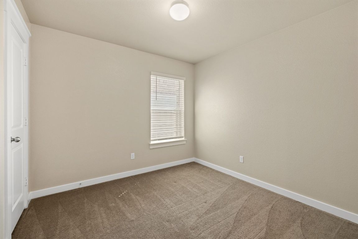 1304 Salt Lick Drive Georgetown, TX 78633 - Photo 20 of 40 an empty room with a window