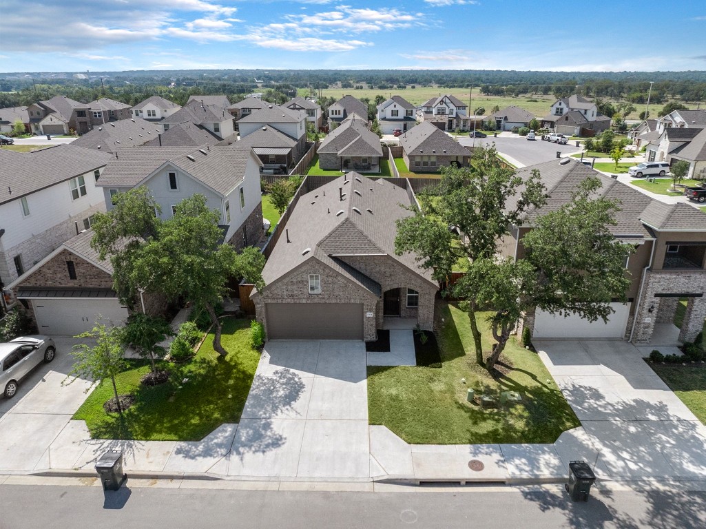 1304 Salt Lick Drive Georgetown, TX 78633 - Photo 2 of 40 an aerial view of a house with a yard basket ball court and outdoor seating
