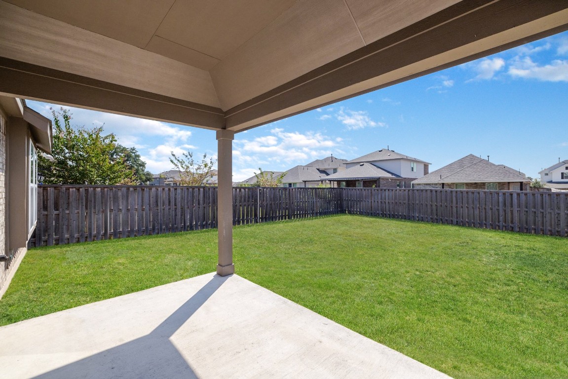1304 Salt Lick Drive Georgetown, TX 78633 - Photo 23 of 40 a view of a backyard with wooden fence