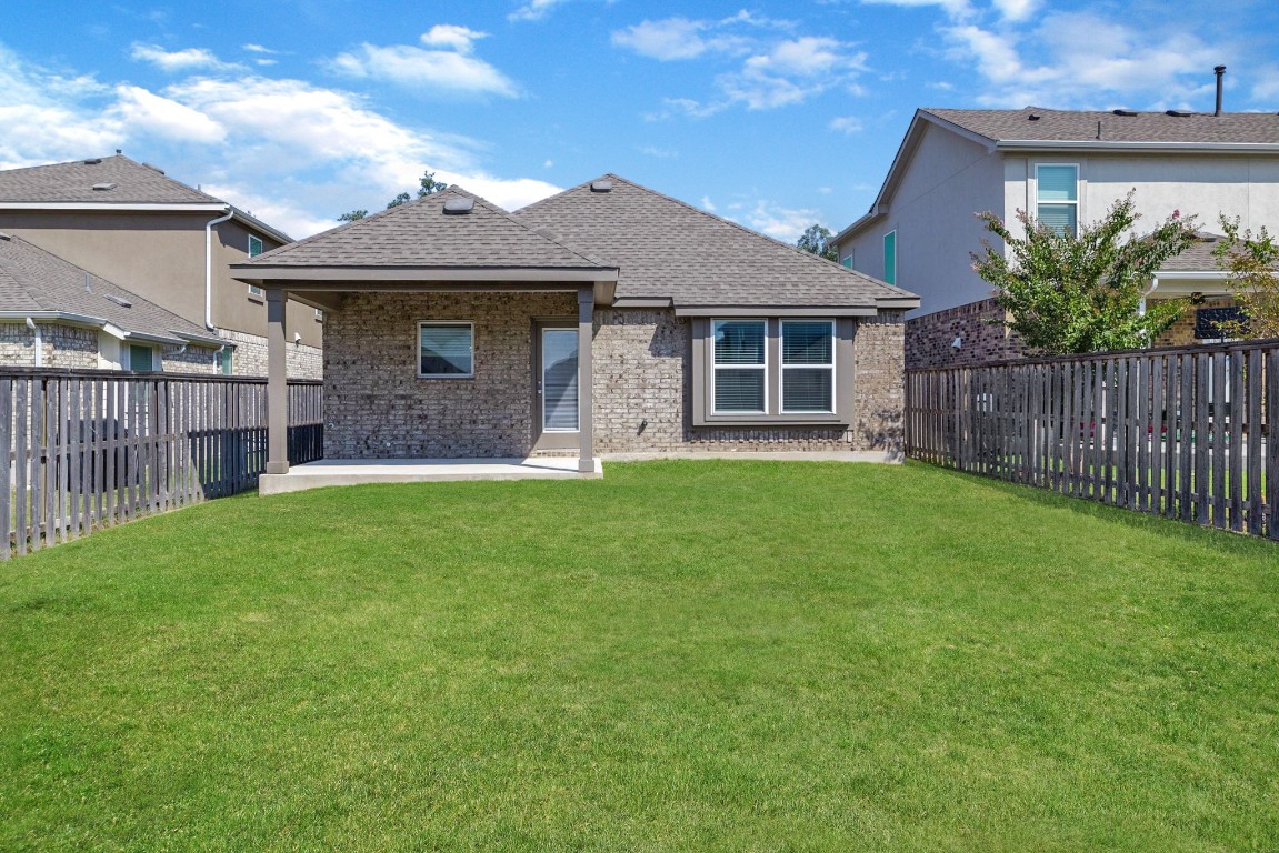 1304 Salt Lick Drive Georgetown, TX 78633 - Photo 25 of 40 a front view of a house with garden