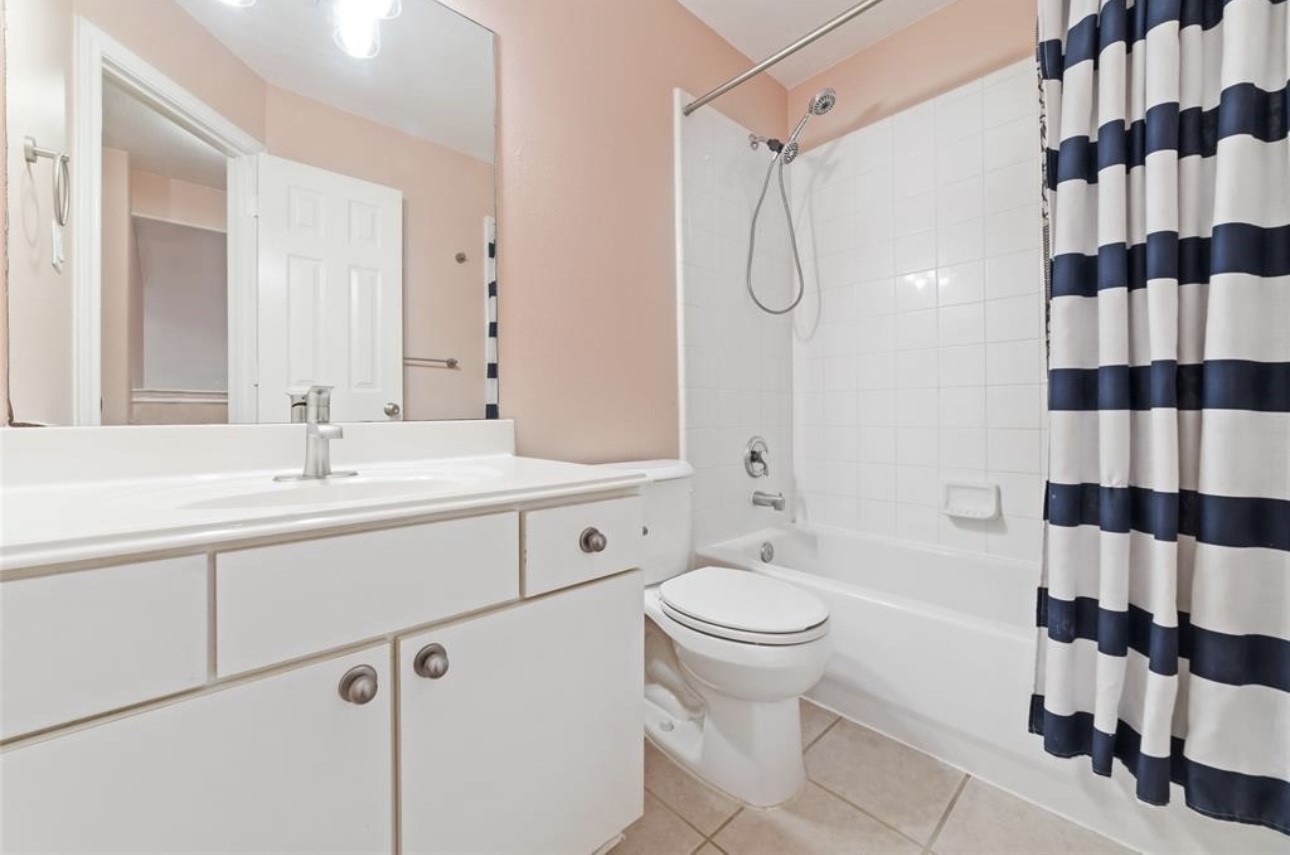 18715 Scented Candle Way Spring, TX 77388 - Photo 24 of 24 a bathroom with a sink a toilet and shower