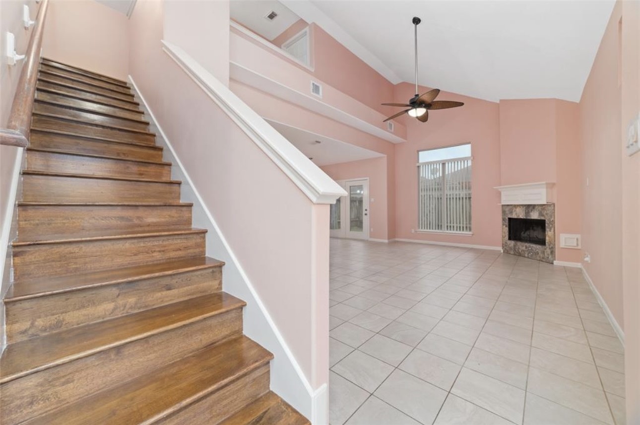 18715 Scented Candle Way Spring, TX 77388 - Photo 7 of 24 a view of entryway and hall with wooden floor