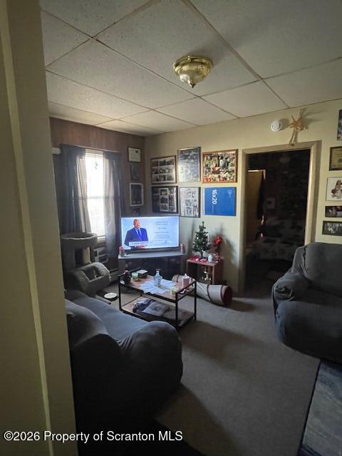 906 Capouse Avenue Scranton, PA 18509 - Photo 15 of 27 a living room with furniture and a flat screen tv