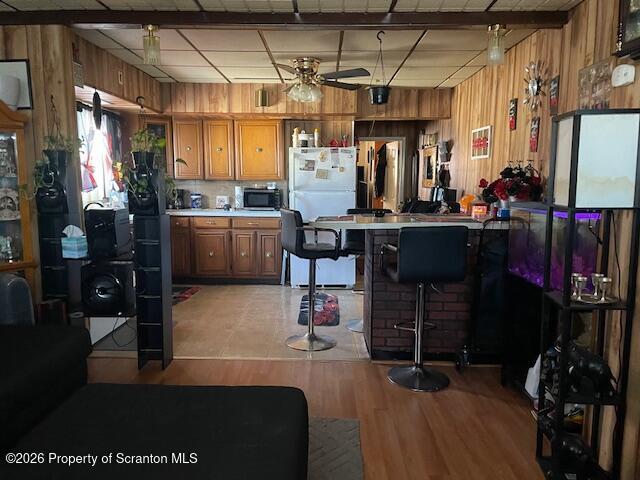 906 Capouse Avenue Scranton, PA 18509 - Photo 22 of 27 a room with lots of wooden furniture and a window
