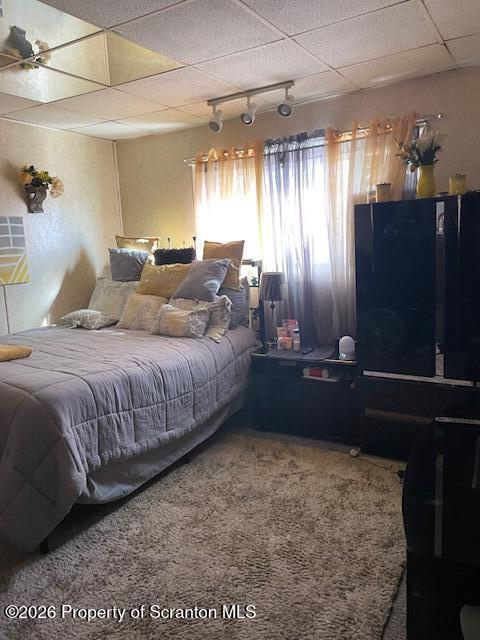 906 Capouse Avenue Scranton, PA 18509 - Photo 24 of 27 a bedroom with a bed and a night stand