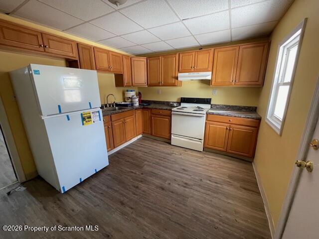 906 Capouse Avenue Scranton, PA 18509 - Photo 6 of 27 a kitchen with stainless steel appliances a refrigerator a sink a stove a microwave and cabinetry