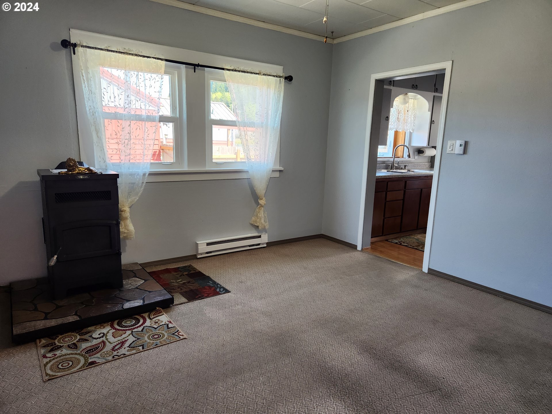 912 Fir Avenue Reedsport, OR 97467 - Photo 15 of 40 an empty room with a window