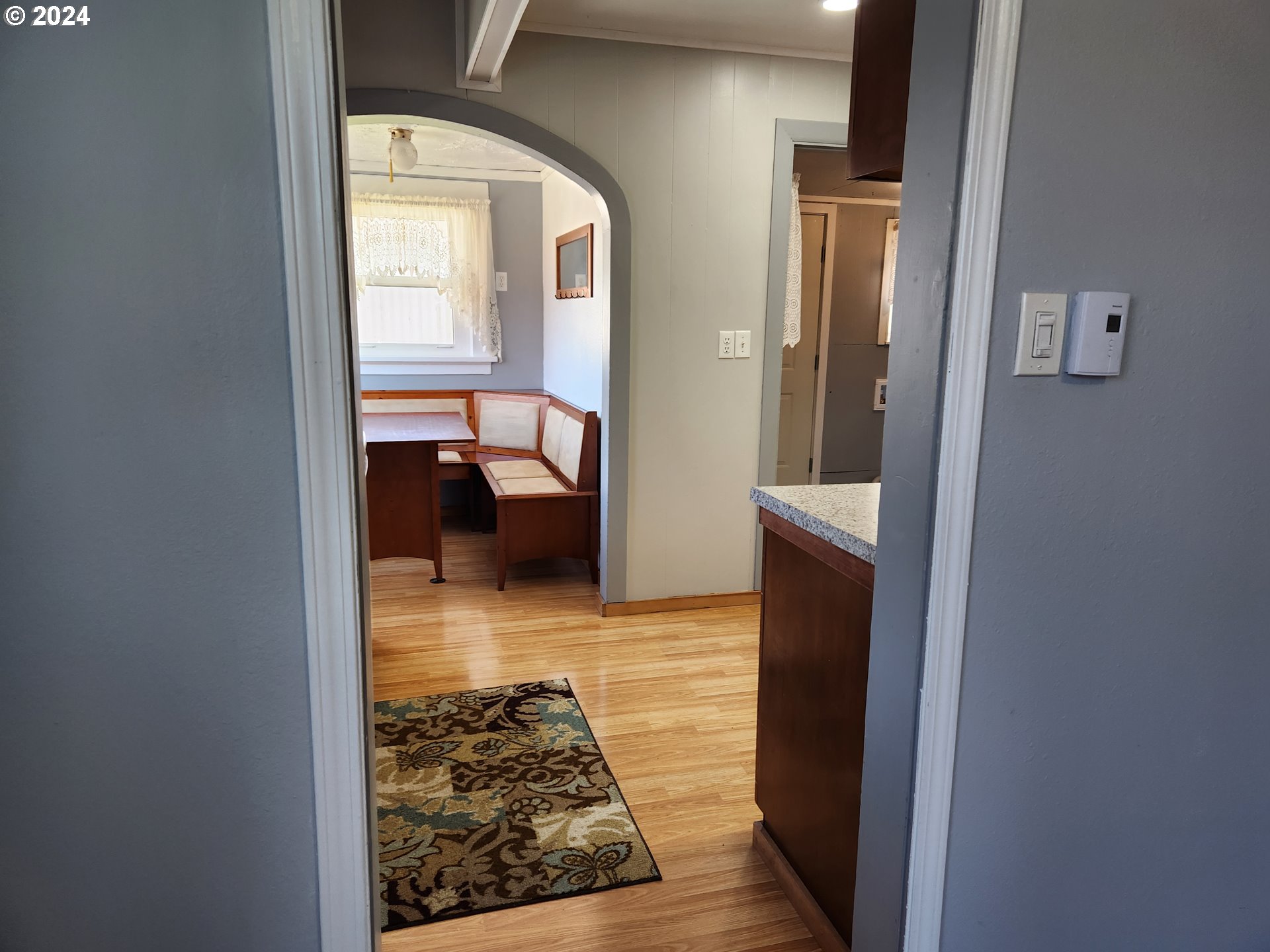 912 Fir Avenue Reedsport, OR 97467 - Photo 17 of 40 a bathroom with a tub and a hallway