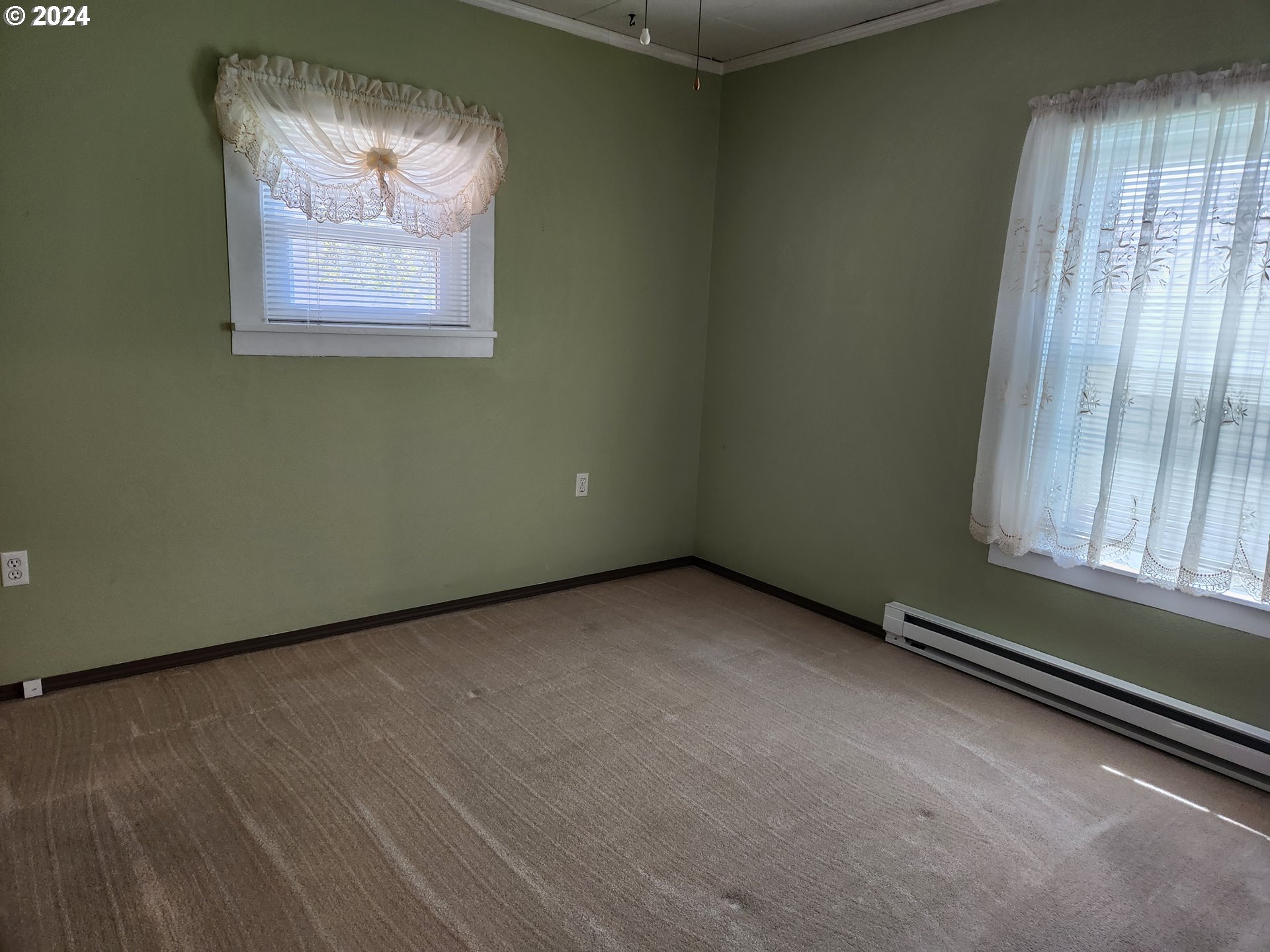 912 Fir Avenue Reedsport, OR 97467 - Photo 29 of 40 a view of an empty room with a window