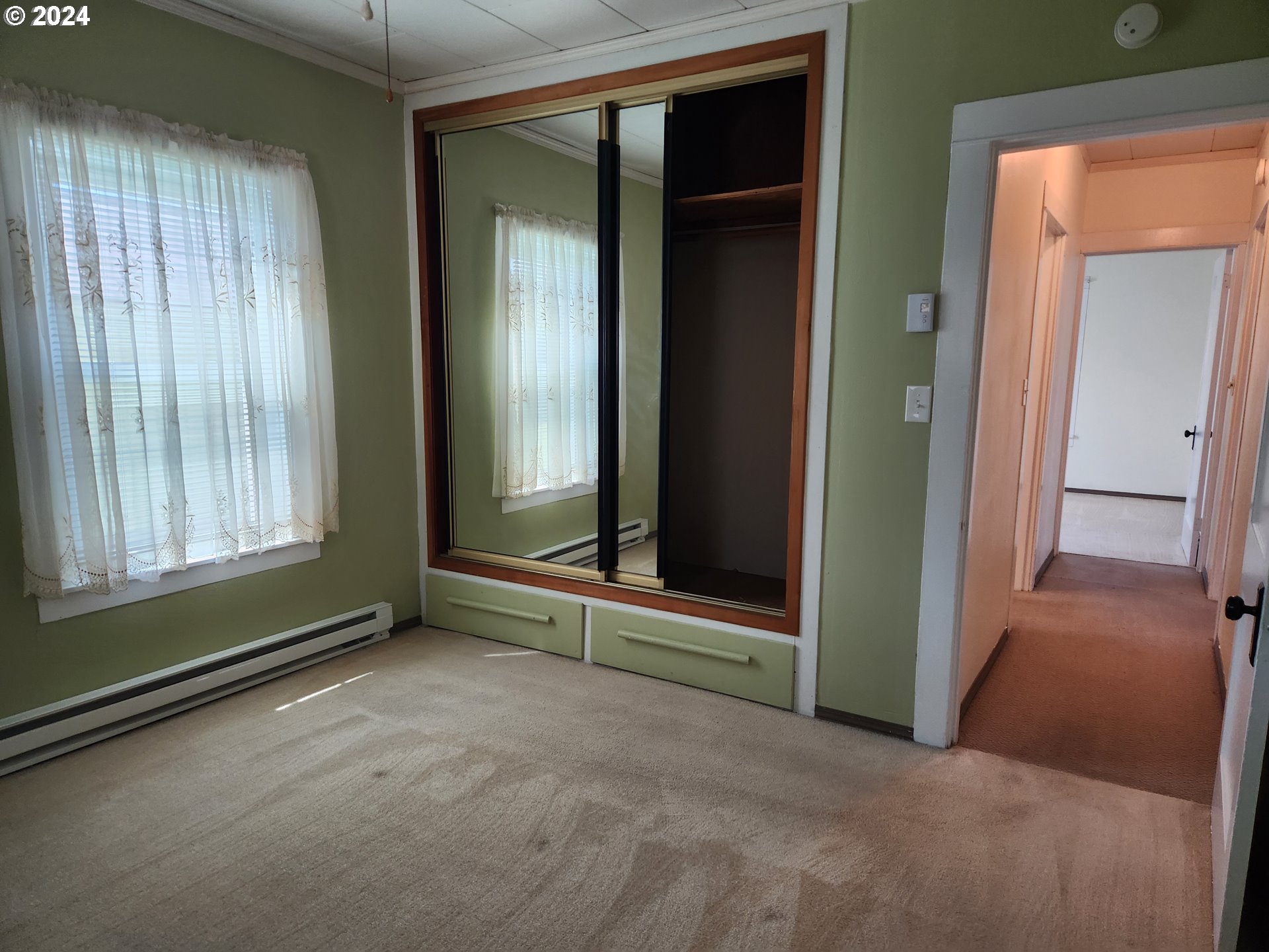 912 Fir Avenue Reedsport, OR 97467 - Photo 30 of 40 an empty room with windows and entrance